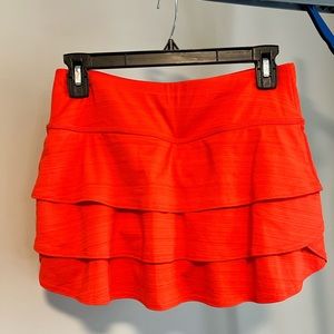 Athleta ruffle skort skirt golf tennis athletic heathered orange red